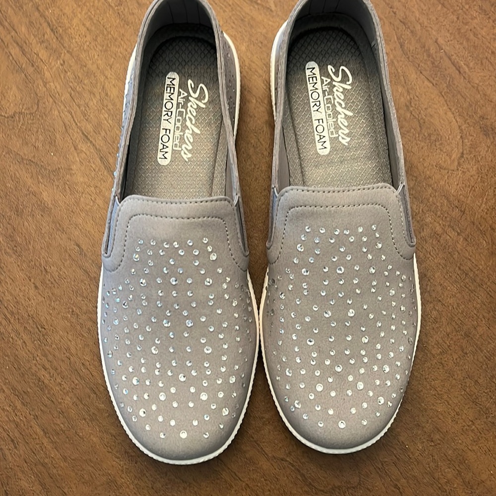 Skechers gray leather with sparkles.
